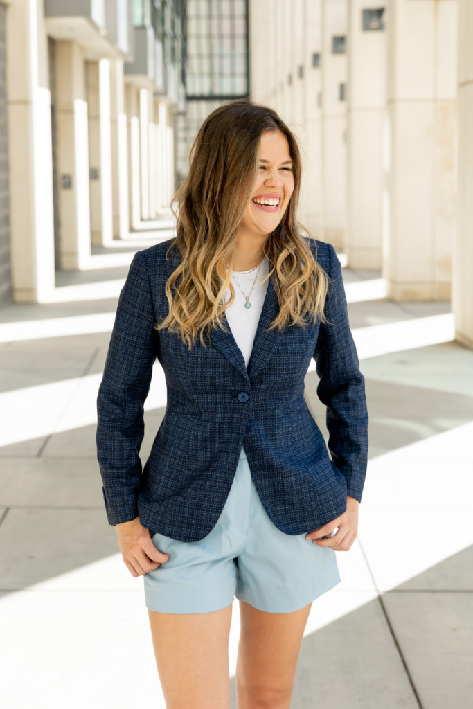 Woman in women's suit shorts.
